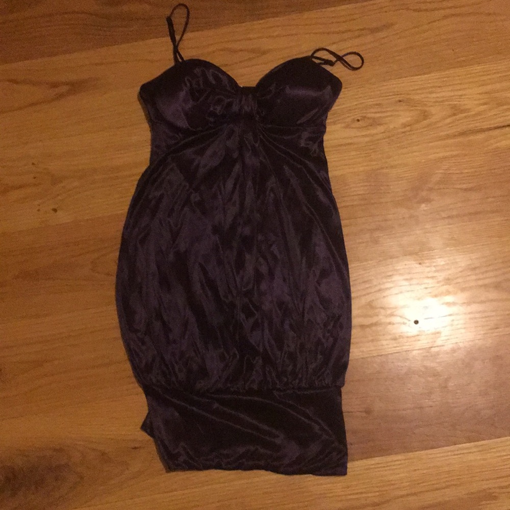 This is a deep purple size small dress/shirt
